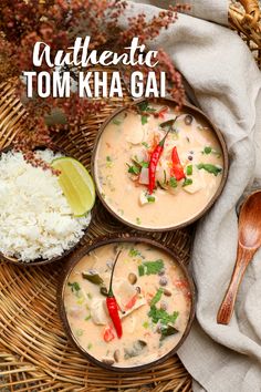 three bowls filled with soup and rice on top of a woven table cloth next to a wooden spoon