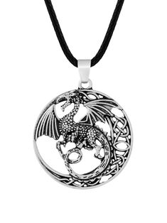 PRICES MAY VARY. Showcases a beautifully crafted circular pendant featuring a detailed dragon entwined in Celtic knotwork, symbolizing power and ancient wisdom Made from high-quality zinc alloy with an antique silver finish, meticulously crafted with intricate details Measures about 1.5 inches (3.8 cm) in diameter and arrives ready to wear on a 19.7" (50 cm) faux leather cord A stunning piece of dragon jewelry that makes a wonderful Valentine's Day, Christmas, birthday, or anniversary gift 100% customer satisfaction with 30 days money back guarantee or free replacement. No questions asked! Celtic Knot Dragon, Dragon Crest, Dragon Totem, Celtic Knot Necklace, Celtic Knotwork, Dragon Necklace, Dragon Jewelry, Magical Jewelry, Antique Pendant