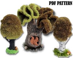 an image of three trees made out of knitted yarns and wool felts