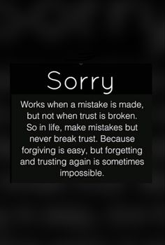 the words sorry are written in black and white on a dark background with an image of a