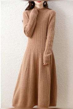 Elegant and sophisticated, the Long Wool Dress is a timeless wardrobe staple. Crafted from high-quality wool, it offers both warmth and style. Its minimalist design makes it versatile for various occasions, from formal events to casual outings. Embrace classic elegance with the Long Wool Dress, a must-have piece for your collection. Long Wool Dress, Sweater Dress Long, Wool Sweater Dress, Jumper Outfit, Long Sweater Dress, Women Sweaters Winter, Timeless Wardrobe, Timeless Wardrobe Staples, Comfortable Sweater