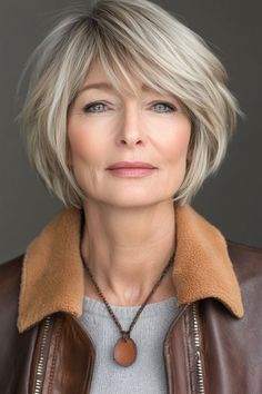 Discover 30 stylish short hairstyles for women over 50, from sleek bobs to modern shags, that are easy to maintain and perfect for any occasion. Moms Hairstyles, Bob With Wispy Bangs, Adele Weight, Chin Length Haircuts, Haircuts For Medium Length Hair, Fine Straight Hair, Bangs For Women, Hairstyles And Haircuts, Chin Length Hair