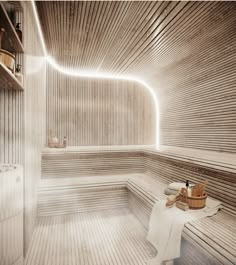 an artisticly designed bathroom with wooden walls and flooring is featured in this image