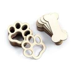 wooden dog paw and bone shaped cookie cutters, set of 6 pieces in white background