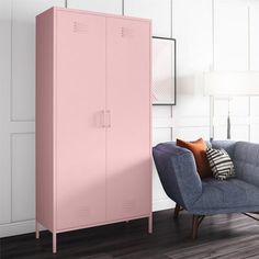 a pink cabinet next to a blue chair