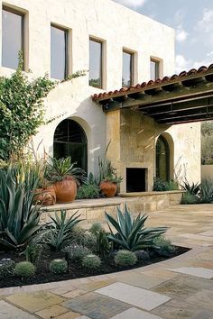 Mediterranean outdoor kitchen with rustic elements and lush greenery around Mediterranean Outdoor Kitchen, Rockery Garden Ideas, Outdoor Kitchen Setup, Garden Ideas Diy, Cooking Outside, Rockery Garden, Kitchen Setup