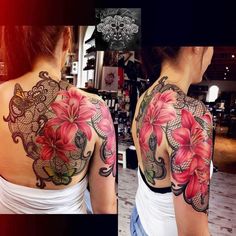 the back of a woman's shoulder with red flowers and laces on it