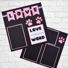 two black and pink cards with paw prints on them that say love is a four legged word