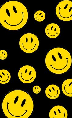 yellow smiley faces on black background