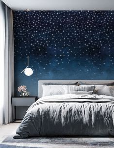 a bedroom with stars painted on the wall