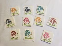 six cards with different colored flowers on them