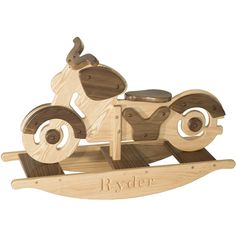 a wooden toy with a motor bike on it's front wheel and the word ryder written