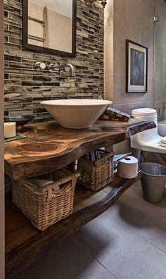 a bathroom with a sink, toilet and tub in it's centerpieces