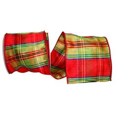 two red and green plaid cloths are folded up on each other's sides