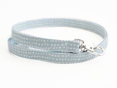 This pretty light blue colored lanyard offers a great way to wear your ID badge or keep track of your keys this spring season! Made from 4 layers of high quality cotton fabric, my lanyards combine flexibility with durability. They are constructed to be comfortable enough to wear around your neck all day. This lanyard measures approximately 1/2 inch wide (approx. 13 mm) and is available in three lengths: 15.5 inch drop 17.5 inch drop 19.5 inch drop Lanyard lengths are measured from the loop on on Road Trip Packing List, Light Blue Fabric, Neck Lanyard, Fabric Lanyard, Merchandise Bags, Teacher Lanyard, Key Lanyard, Pretty Lights, Id Badge Holders