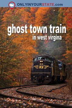 a train traveling through a forest covered in fall leaves with the words ghost town train in west virginia