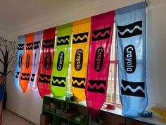 colorful banners hanging from the ceiling in a classroom