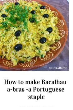 a plate filled with rice and olives on top of a table