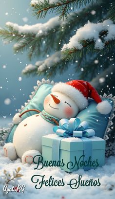 a christmas card with a snowman laying on top of a present under a tree