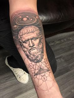 a person with a tattoo on their arm