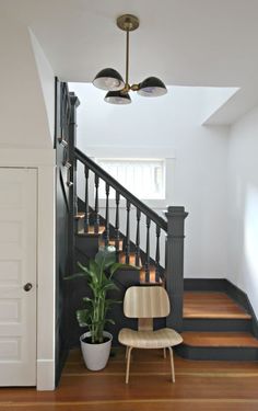 the stairs in this house have been painted black