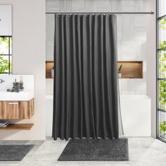 a bathroom with a sink, mirror and shower curtain in grey color on the wall