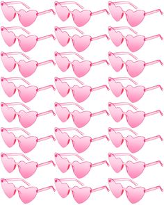 pink heart shaped sunglasses are lined up against a white background