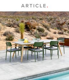 a table and chairs near a pool with the words article written above it in white