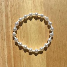 Cheap White Beaded Stretch Bracelet, Adjustable Pearl Stretch Bracelet With 8mm Beads, Trendy White Beaded Pearl Bracelet, Pearl Stretch Bracelet With 8mm Beads As Gift, Pearl Beaded Stretch Bracelet, Casual Pearl Jewelry With Round Beads, Casual Round Pearl Bead Jewelry, Casual Round Pearl Bead Bracelet, Trendy Beaded Bracelets With Pearl Charm