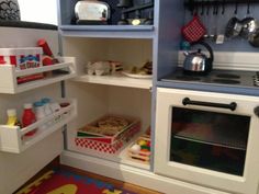 an image of a small child's play kitchen