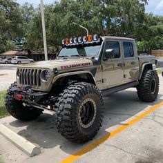 a jeep is parked in a parking lot