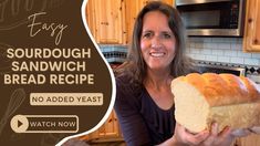 a woman holding a loaf of bread in her hands with the caption, fast sourdough sandwich bread recipe no added yeast