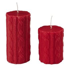 two red candles are next to each other