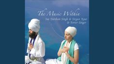 two people dressed in white sitting next to each other on the cover of a book