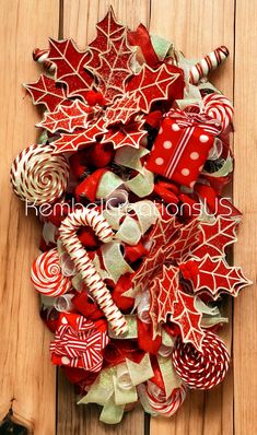 a christmas wreath with candy canes and candies