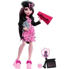 a doll holding a pink megaphone next to a camera