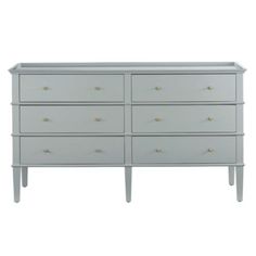 a white dresser with six drawers and two handles on the top, in front of a white background