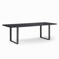 a black table with metal legs on a white background