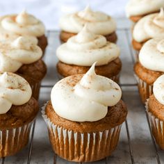 cupcakes with white frosting and cinnamon sprinkles