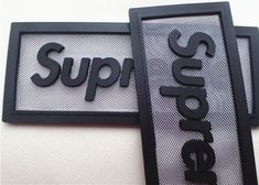 two black and white signs that say support