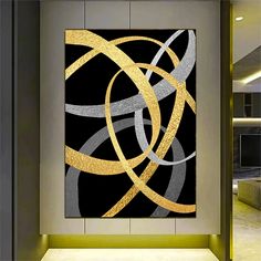 an abstract painting in gold and silver on a black background