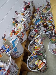 several baskets filled with various items sitting on the floor