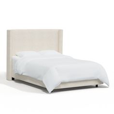 the bed is made up with white sheets and linens on it's headboard