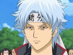 an anime character with white hair and blue eyes, in front of a crowd of people