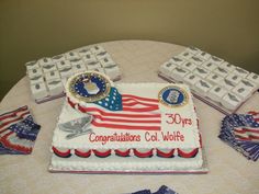 there is a cake that has been decorated with the american flag and other decorations on it