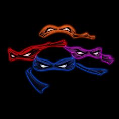 three ninja masks with different colors on them, all in the same pattern and one has eyes