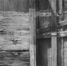 black and white photograph of an old wooden door