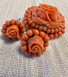 Gorgeous Brooch & Earrings carved salmon Coral rose set-Victorian.  Condition is very good for their age, earrings converted to screw back probably in the early 1900s, pictures show the details.  Brooch approx . 1 1/2" by 1 1/4", earrings diameter approx 3/4", tests for 14k gold, wt.- for set 22.8 grams.  Flowers take never die, Wonderful to find set intact, can be worn separately or together -a vision of loveliness. Luxury Bohemian Coral Jewelry, Luxury Coral Jewelry With Natural Stones, 1900s Pictures, Pearl Bangles Gold, Coral Jewelry Vintage, Silver Payal, Coral Jewelry Set, 4 Earrings, Coral Rose