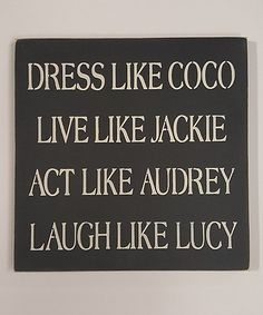 a sign that says dress like coco live like jackie act like audrey laugh like lucky