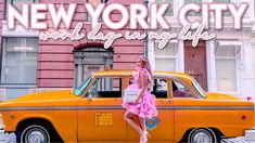 a woman standing in front of a yellow taxi on the street with new york city words above her